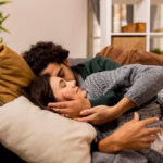 wife-husband-being-comfy-together-sofa_23-2148821589